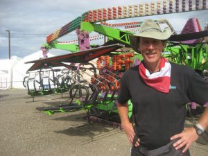 Mike in front of rollercoaster.