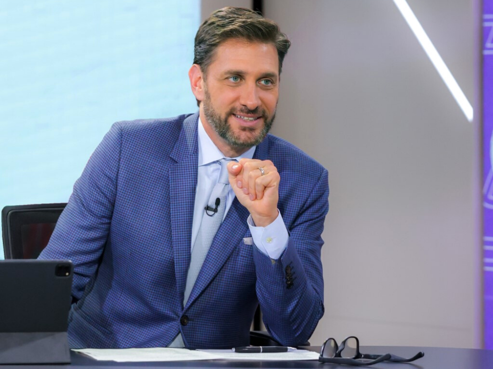 Mike Greenberg at sports desk.
