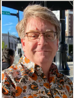 Andy Hullinger in a flowered shirt.